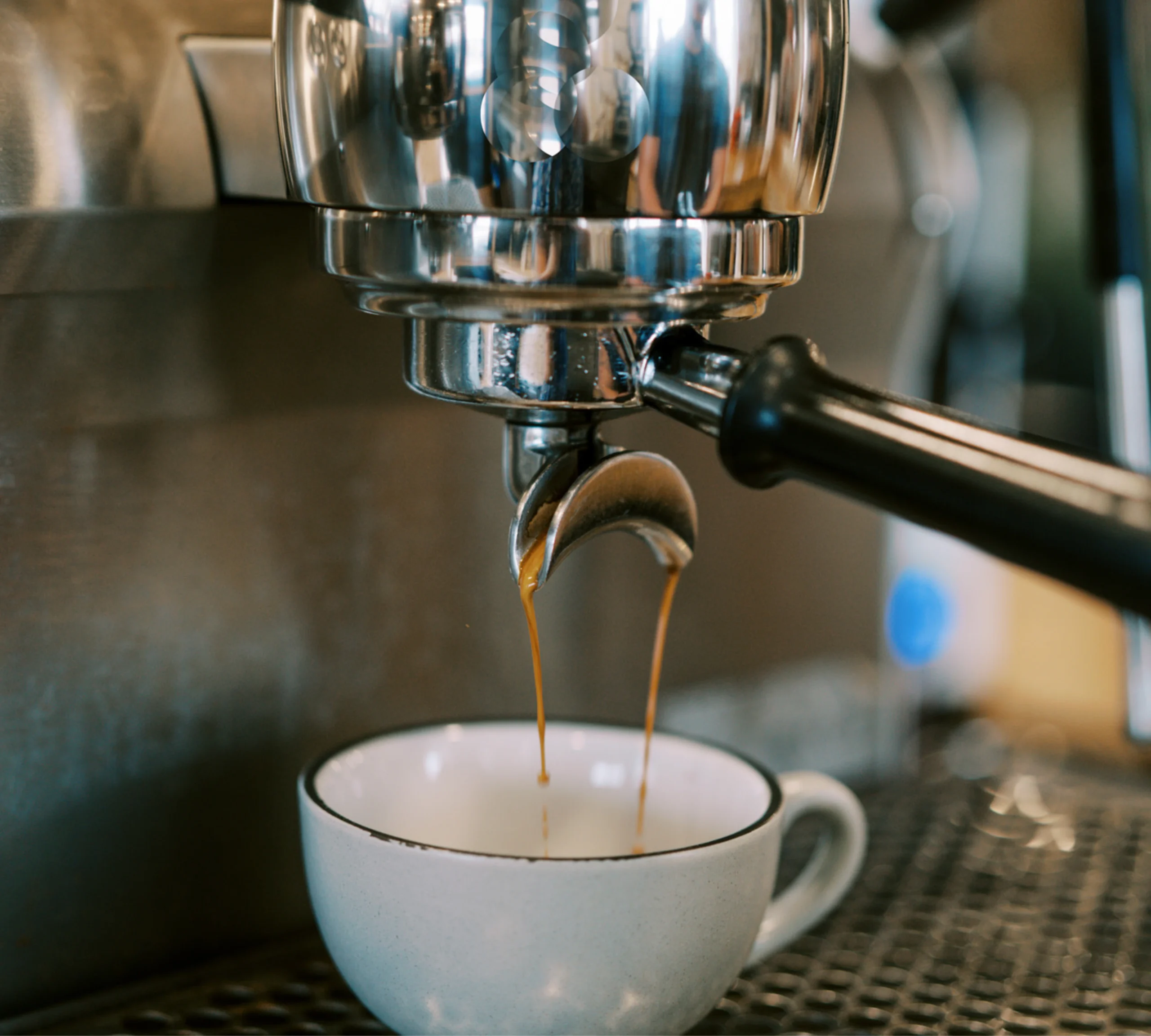 Espresso machine pulling a shot of espresso
